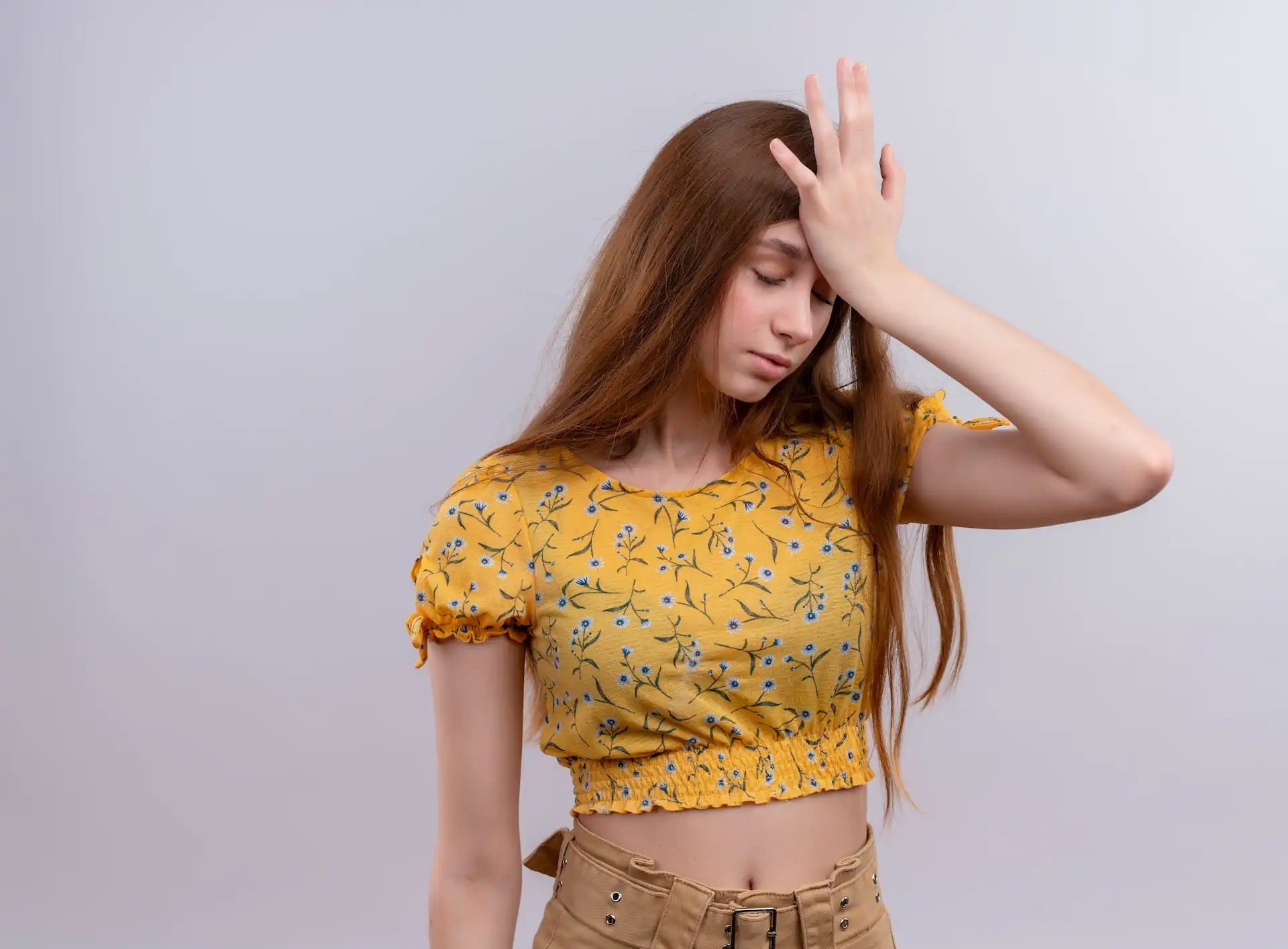 stressed-young-girl-putting-hand-head-isolated-white-wall-with-copy-space